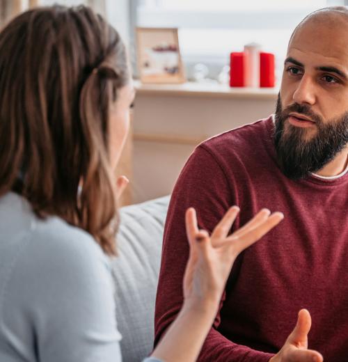 Woman expressing her emotions with her husband.